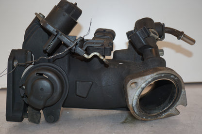 Höger sida på Spjällhus från en H-D Dyna Street Bob FXDB/I -2007 motorcykel.