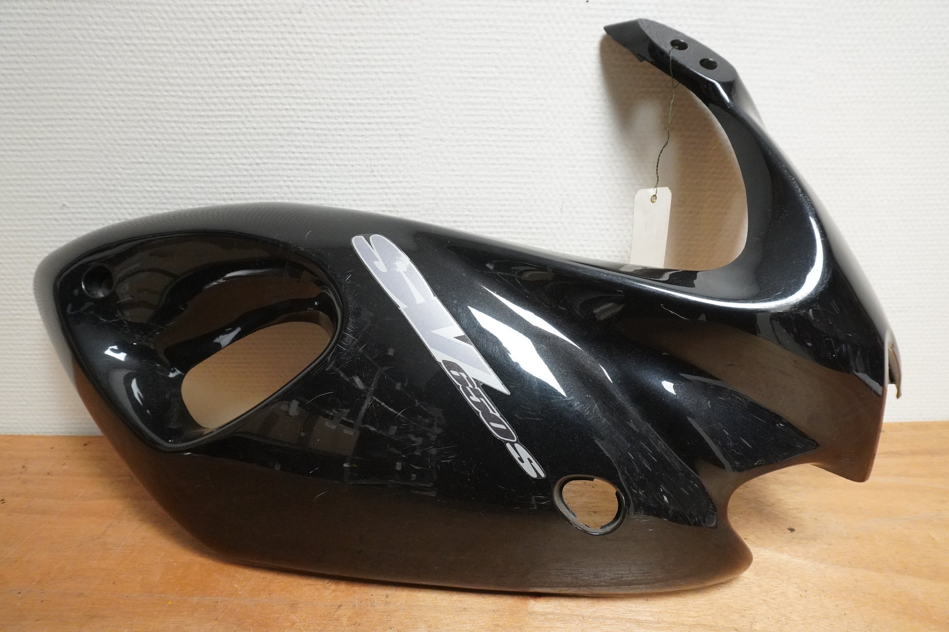 Framsidan på Sidkåpa från en Suzuki SV 650 -2002 motorcykel.