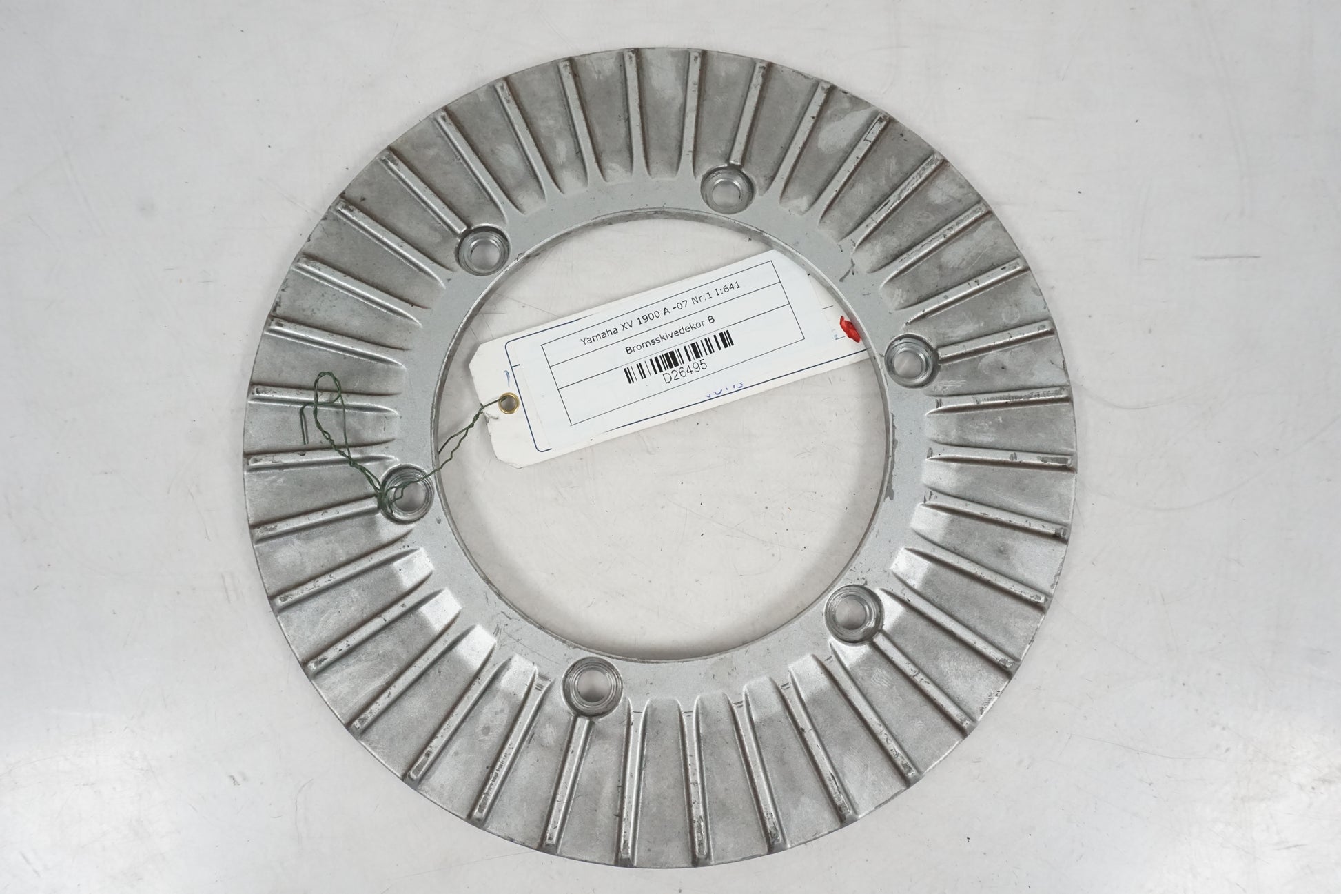 Framsidan på Bromsskivedekor från en Yamaha XV 1900 -2007 motorcykel.