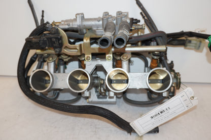 Vänster sida på Spjällhus från en Yamaha FZ-6 -2005 motorcykel.