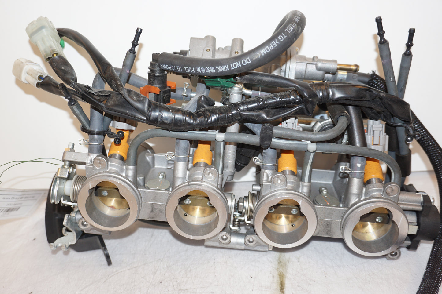 Framsidan på Spjällhus från en Yamaha FZ-6 -2008 motorcykel.