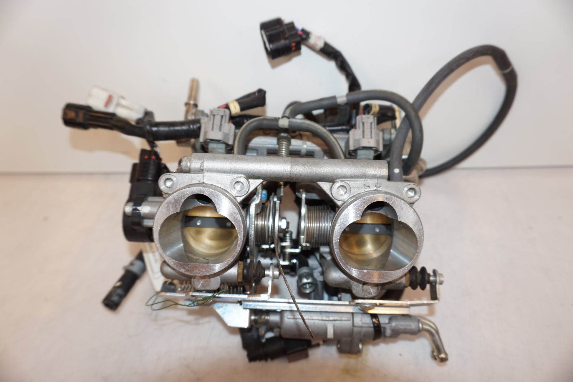 Framsidan på Spjällhus från en Yamaha TDM 900 -2008 motorcykel.