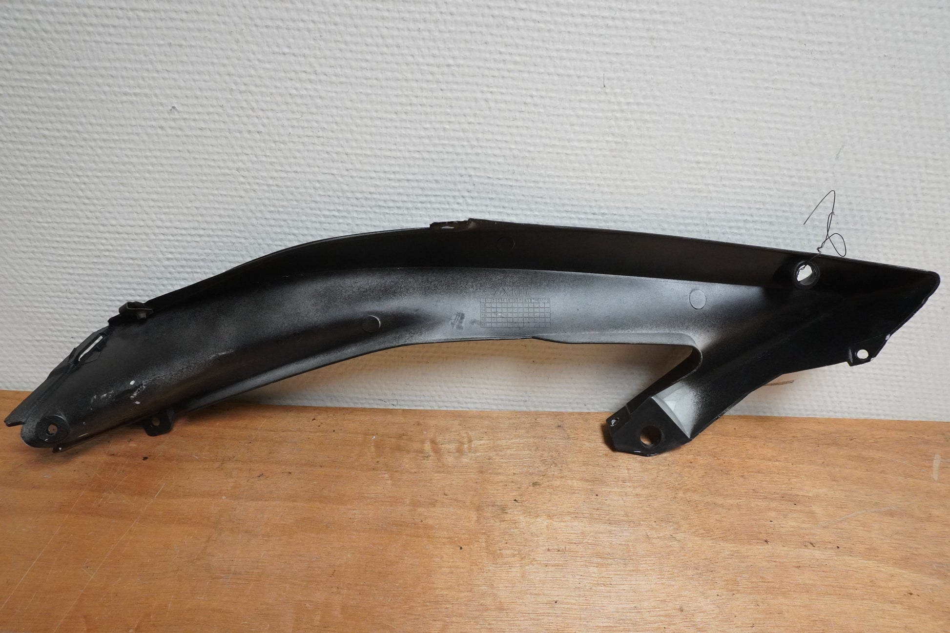 Vänster sida på Sidkåpa från en Yamaha YZF R6 -2006 motorcykel.