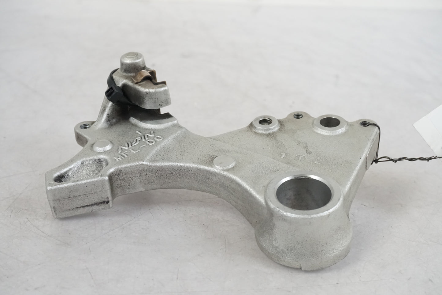 Uchwyt zacisku hamulcowego