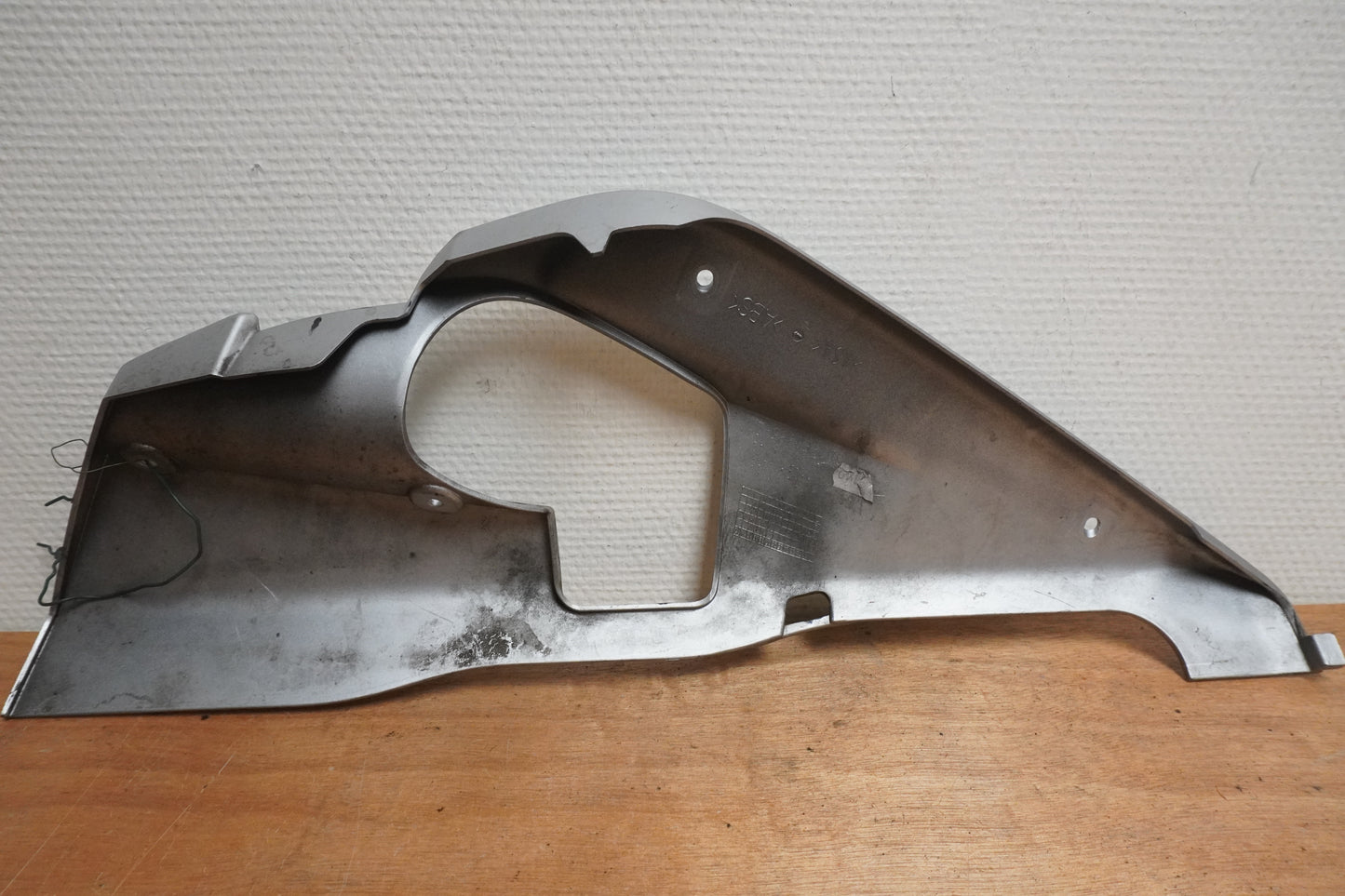 Vänster sida på Magkåpa från en Yamaha YZF-R 125 -2015 motorcykel.