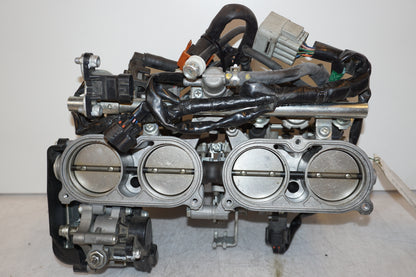 Framsidan på Spjällhus från en Yamaha FZ1-SA -2008 motorcykel.