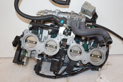 Framsidan på Spjällhus från en Yamaha FZ-8 -2011 motorcykel.