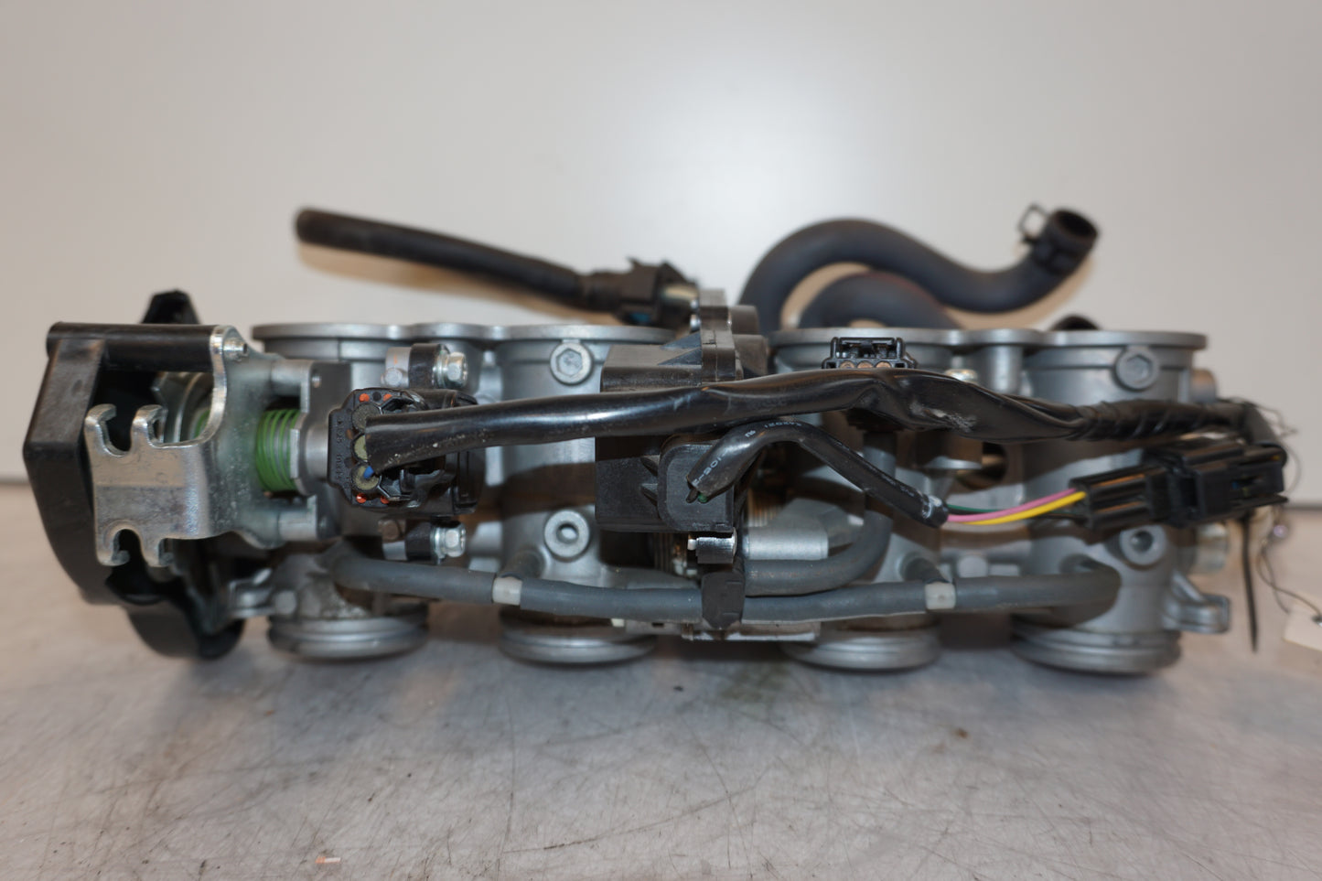 Baksidan på Spjällhus från en Yamaha FZ-8 -2011 motorcykel.