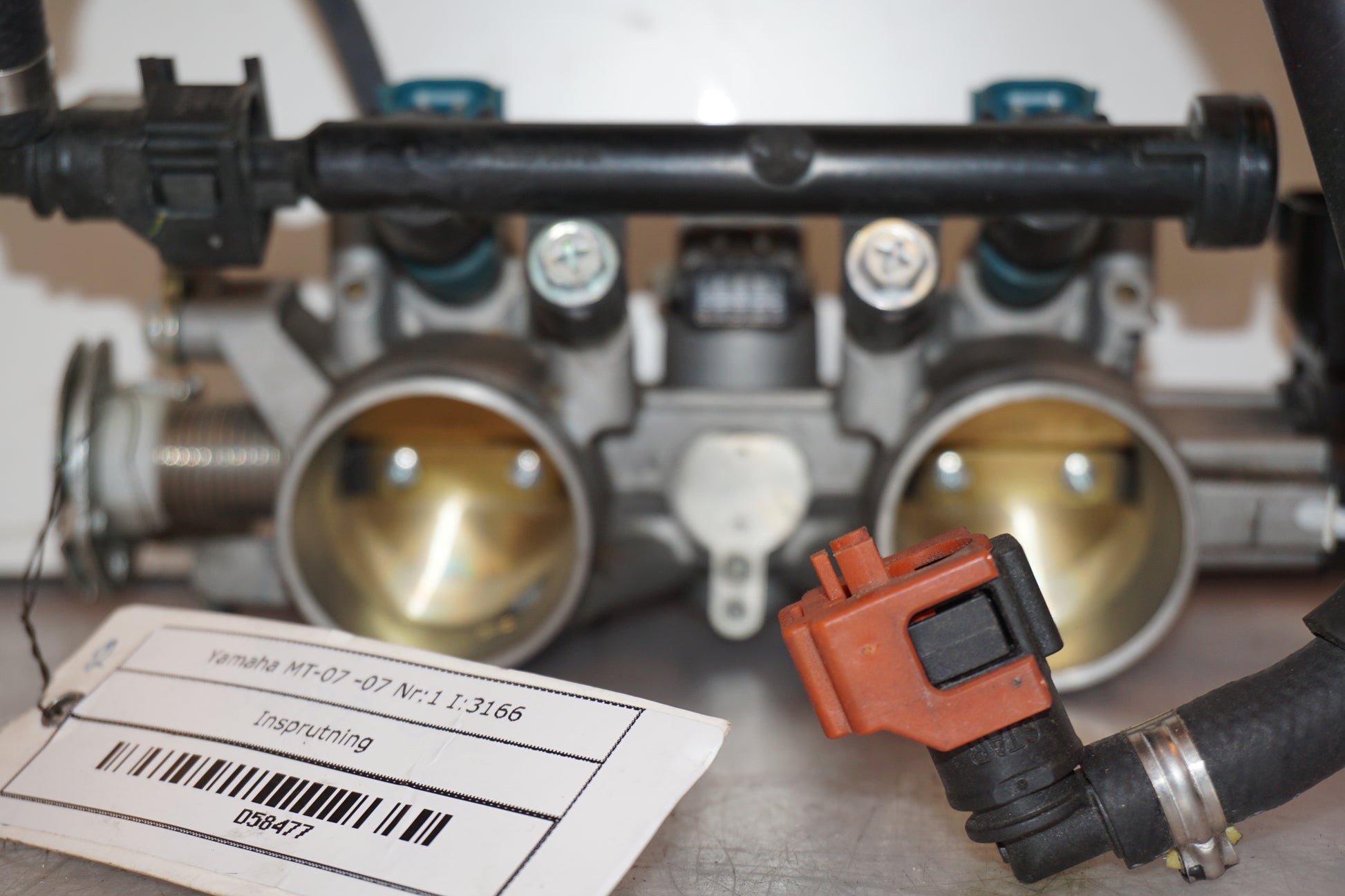 Baksidan på Spjällhus från en Yamaha MT-07 -2014 motorcykel.