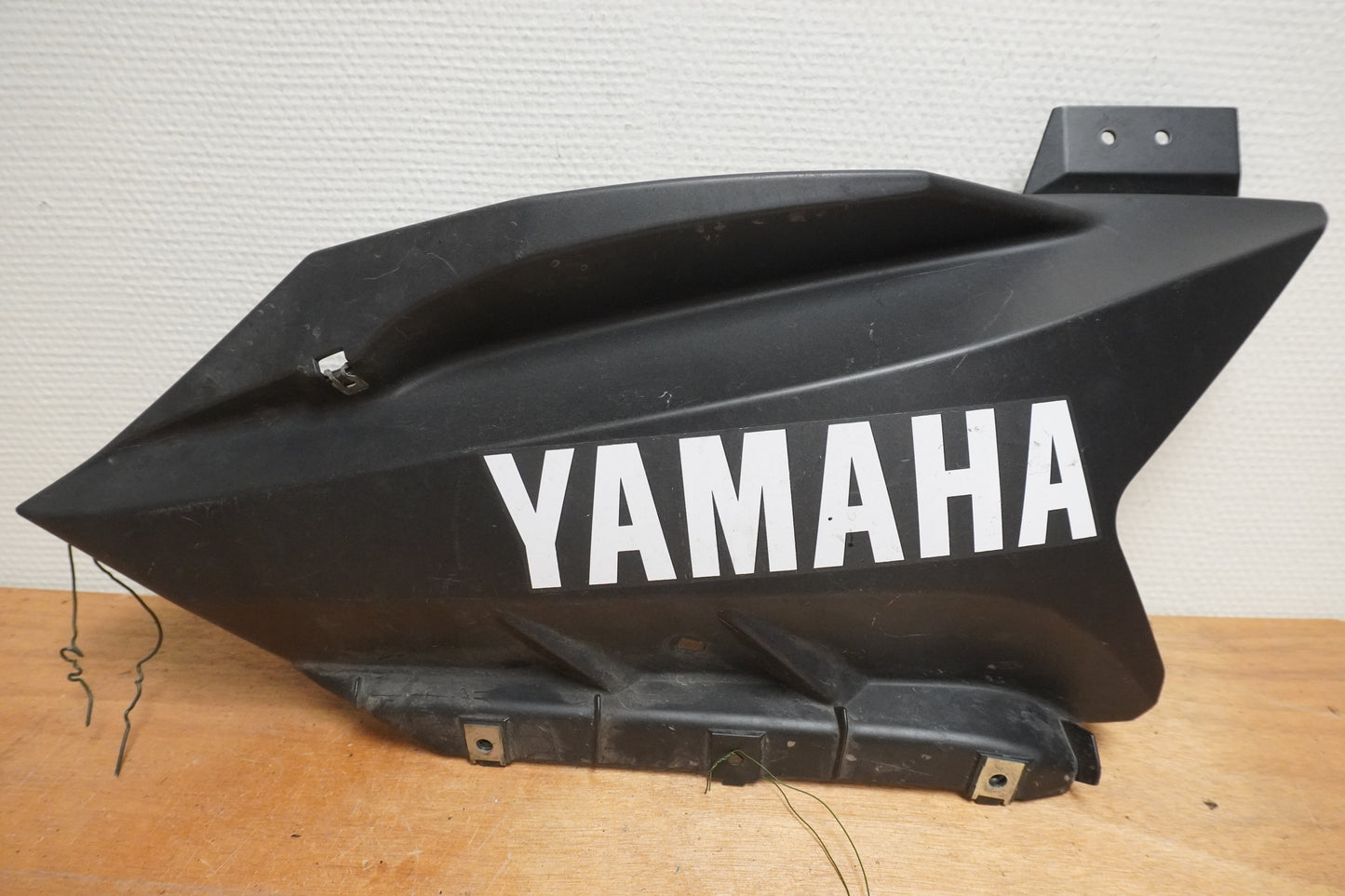 Framsidan på Magkåpa från en Yamaha YZF-R 125 -2009 motorcykel.