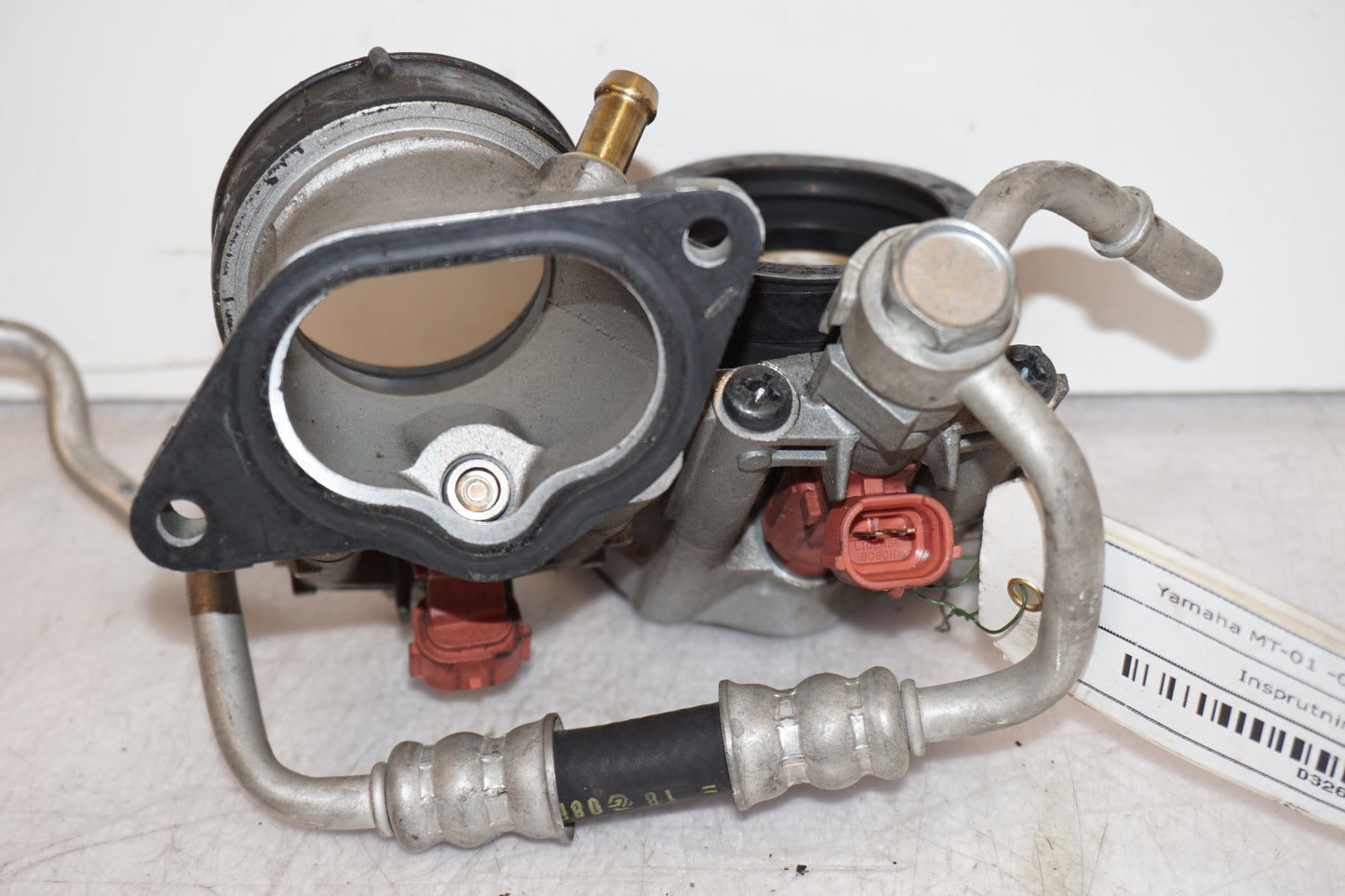 Höger sida på Spjällhus från en Yamaha MT-01 -2009 motorcykel.