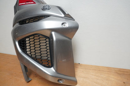 Vänster sida på Sidkåpa från en Yamaha XT 1200 Z -2011 motorcykel.