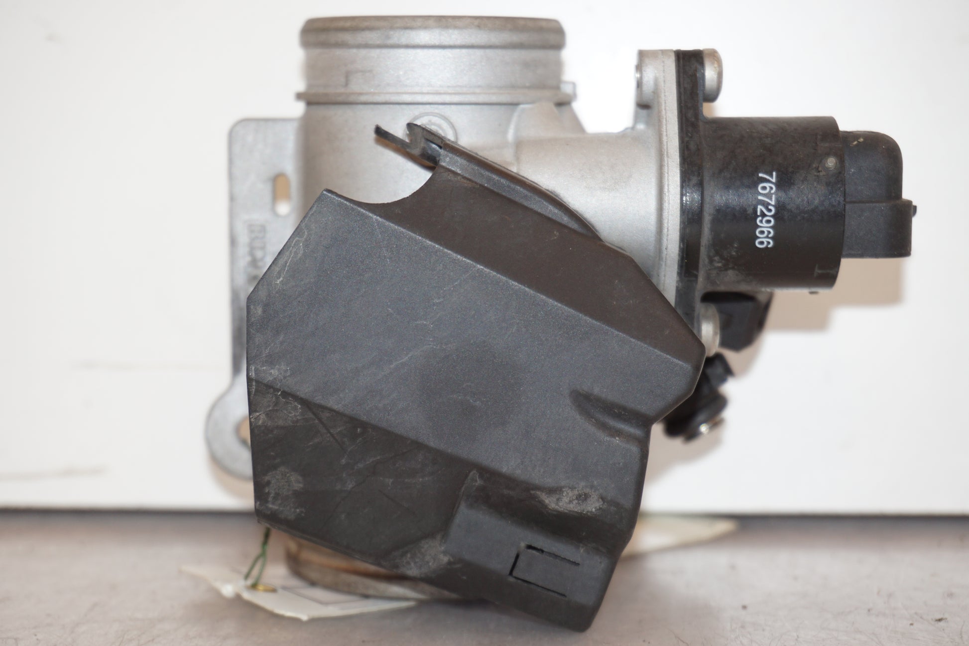 Framsidan på Spjällhus från en BMW R 1200 R -2007 motorcykel.