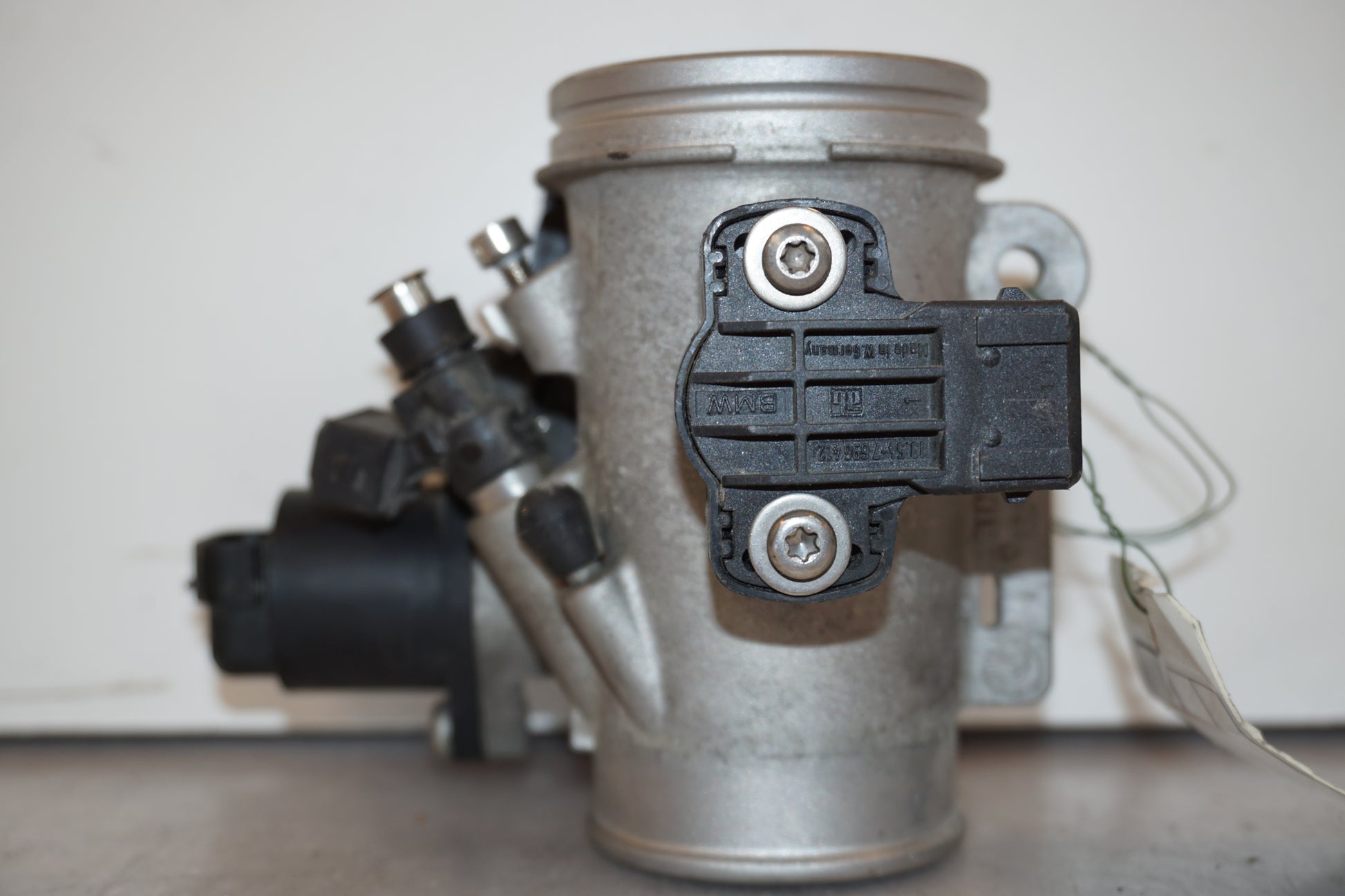 Vänster sida på Spjällhus från en BMW R 1200 RT -2011 motorcykel.