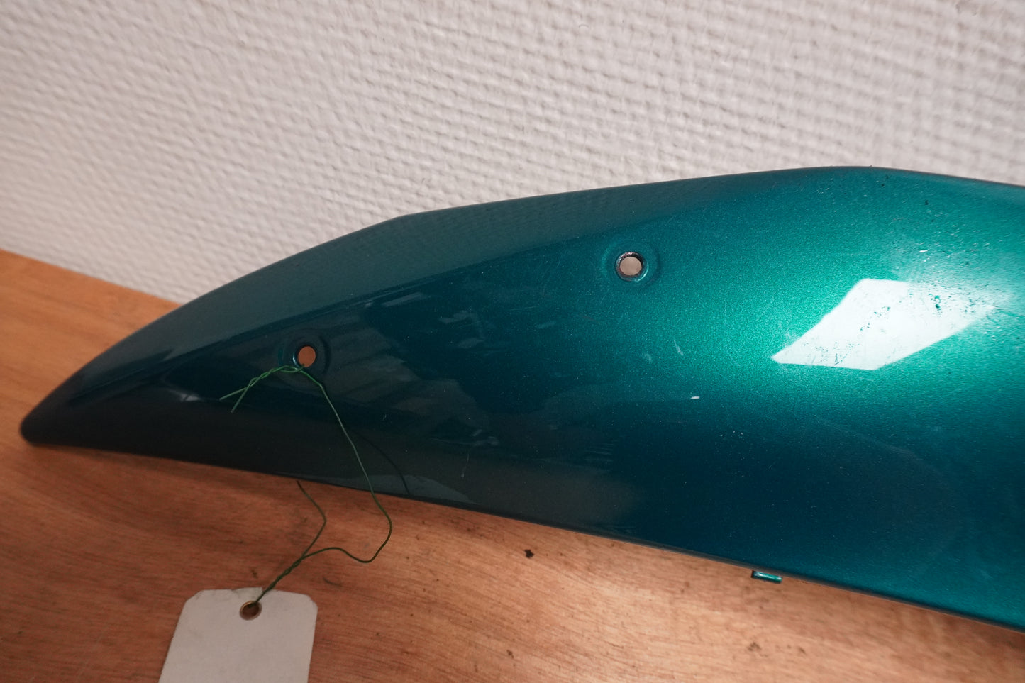 Framsidan på Sidkåpa från en Yamaha YZF R6 -2007 motorcykel.