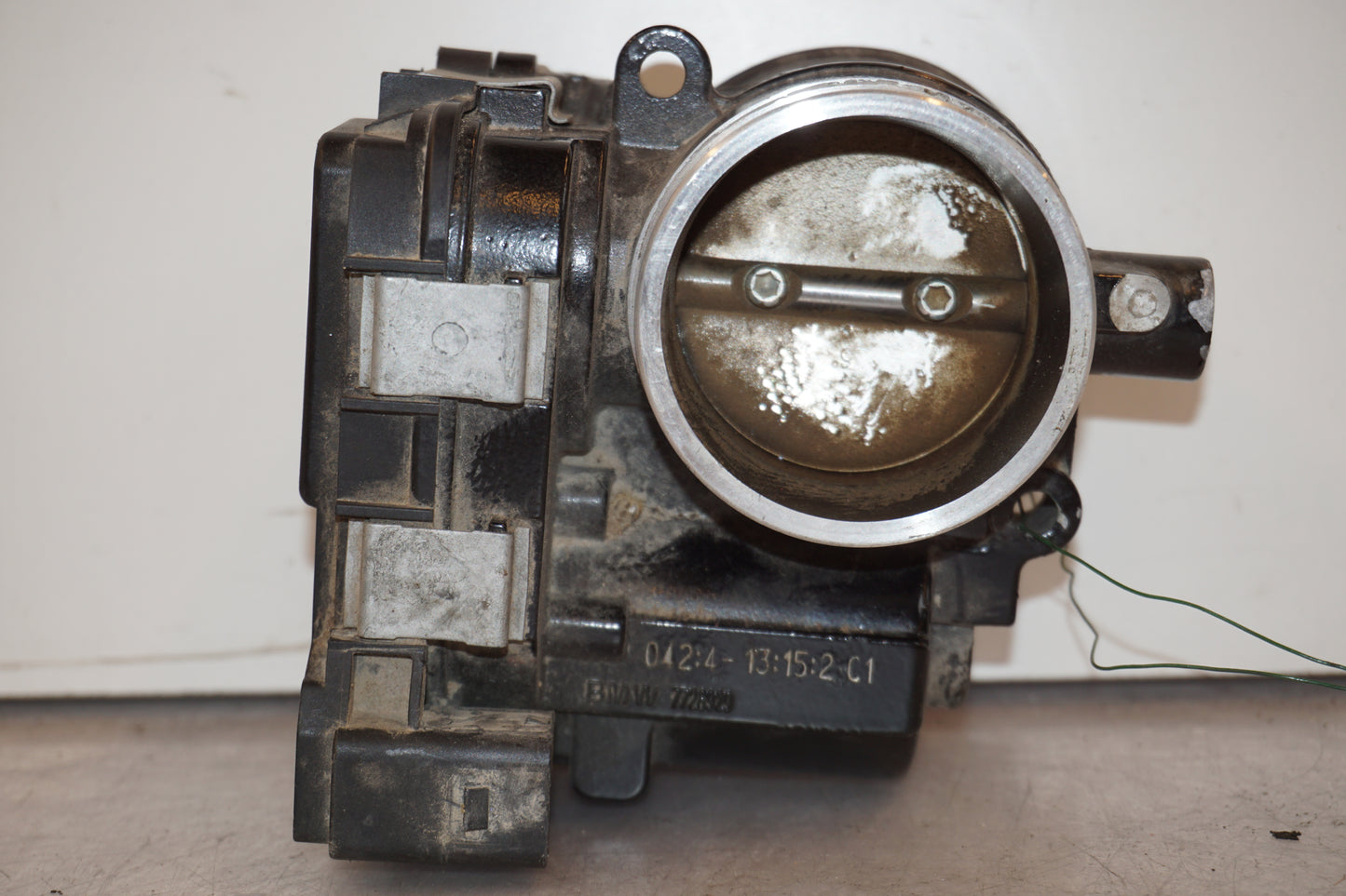 Framsidan på Spjällhus från en BMW R 1200 GSA -2014 motorcykel.