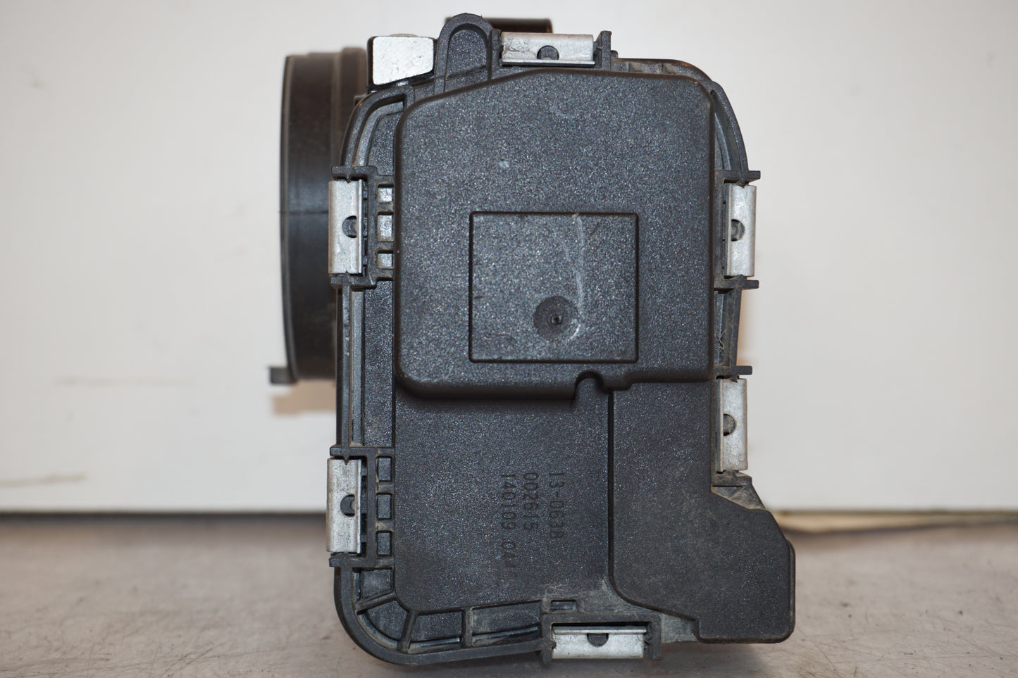 Baksidan på Spjällhus från en BMW R 1200 GSA -2014 motorcykel.