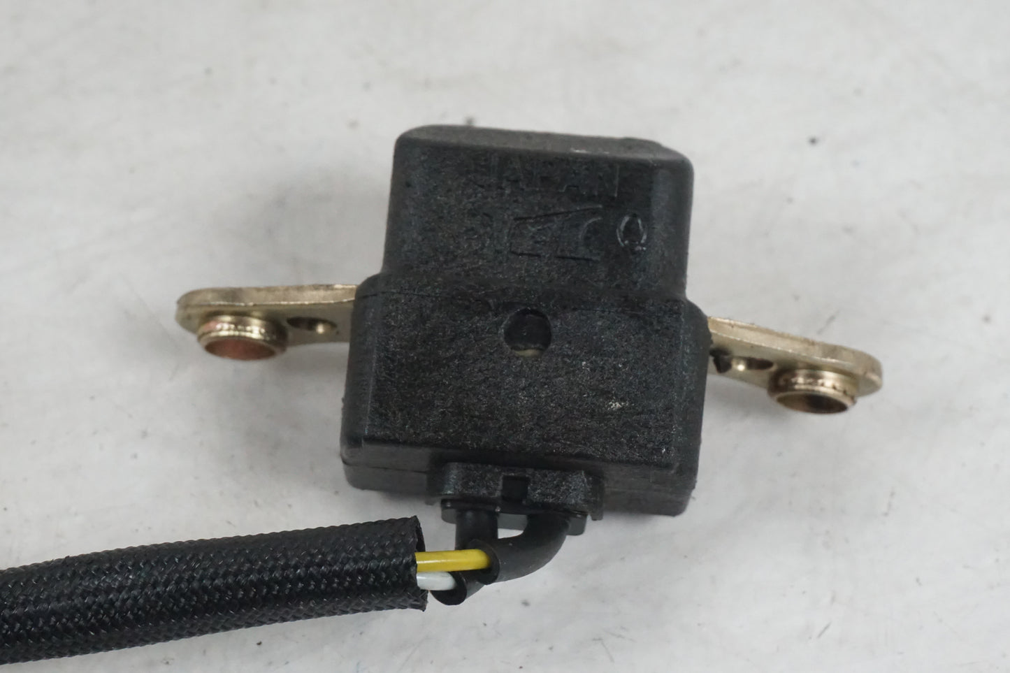 Baksidan på Tändpickup från en Honda CB 600 Hornet -1998 motorcykel.