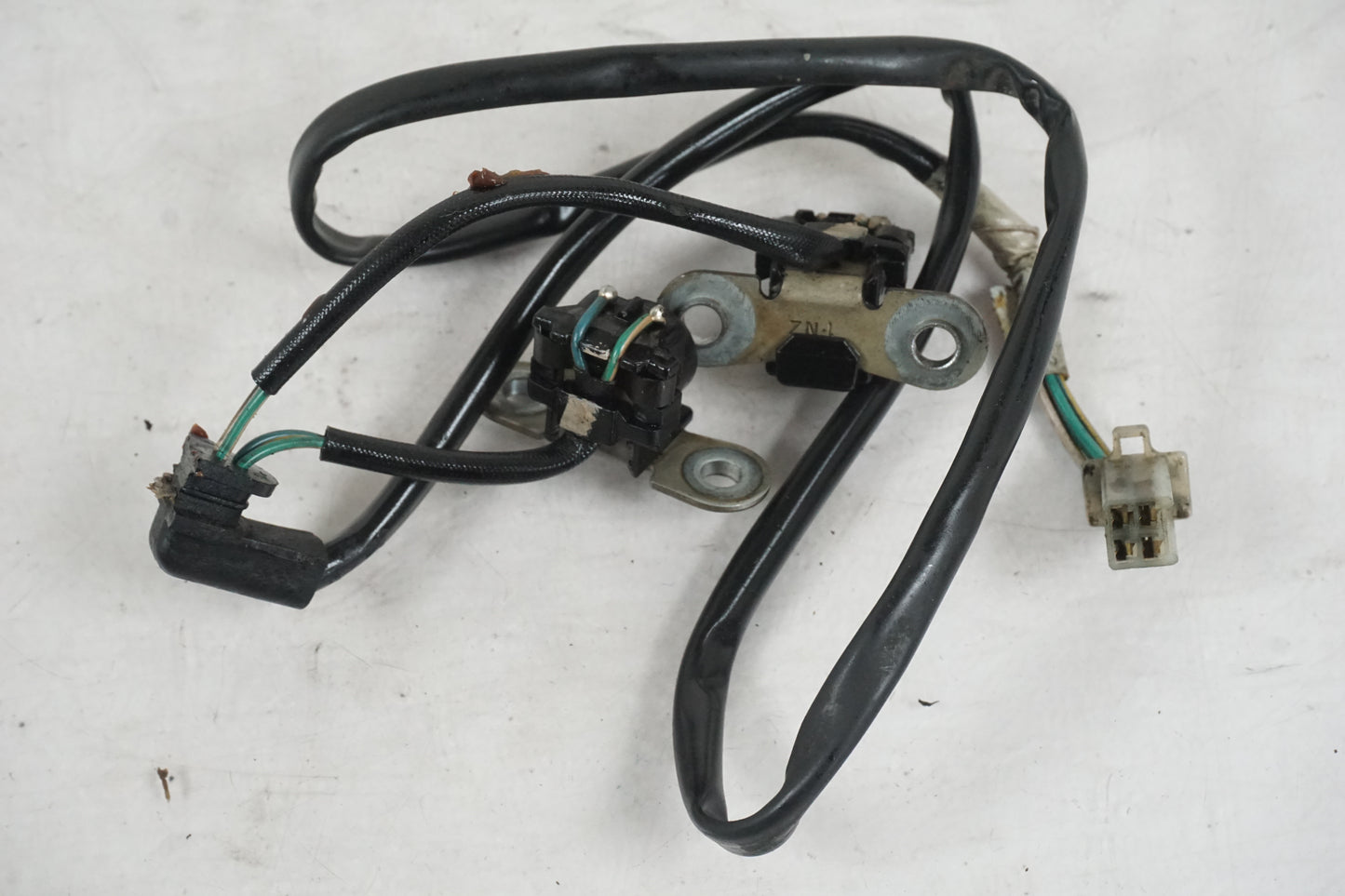 Vänster sida på Tändpickup från en Honda XRV 750 -1993 motorcykel.