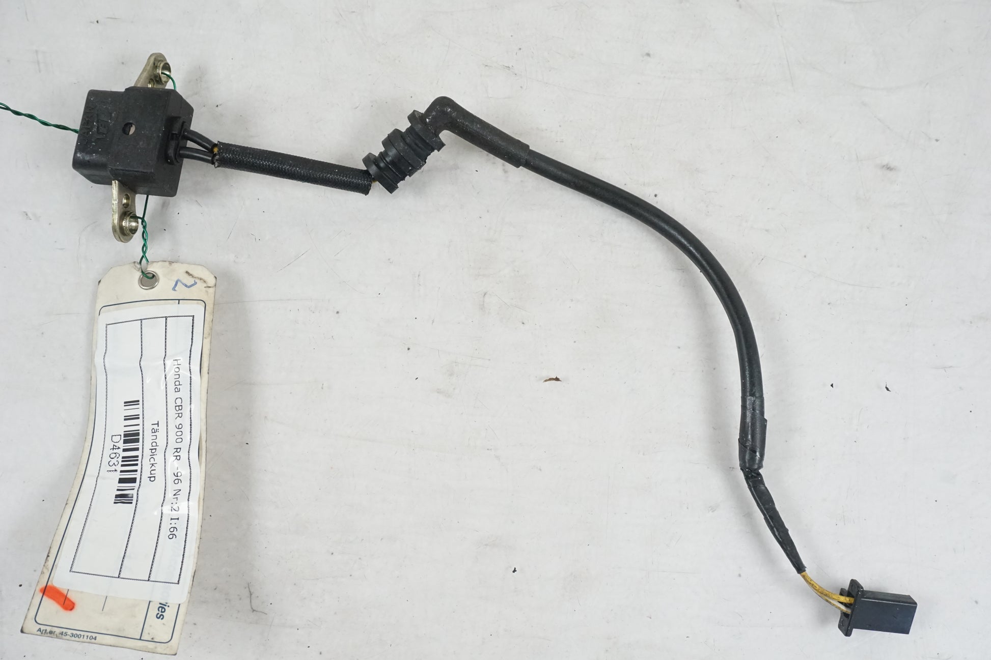 Framsidan på Tändpickup från en Honda CBR 900 RR -1996 motorcykel.