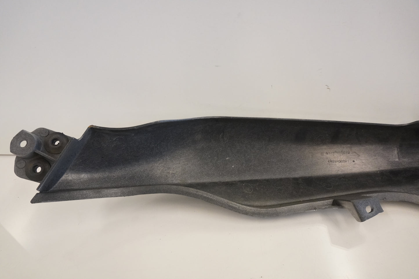 Vänster sida på Bakvinge från en Kawasaki ER 5 -1998 motorcykel.