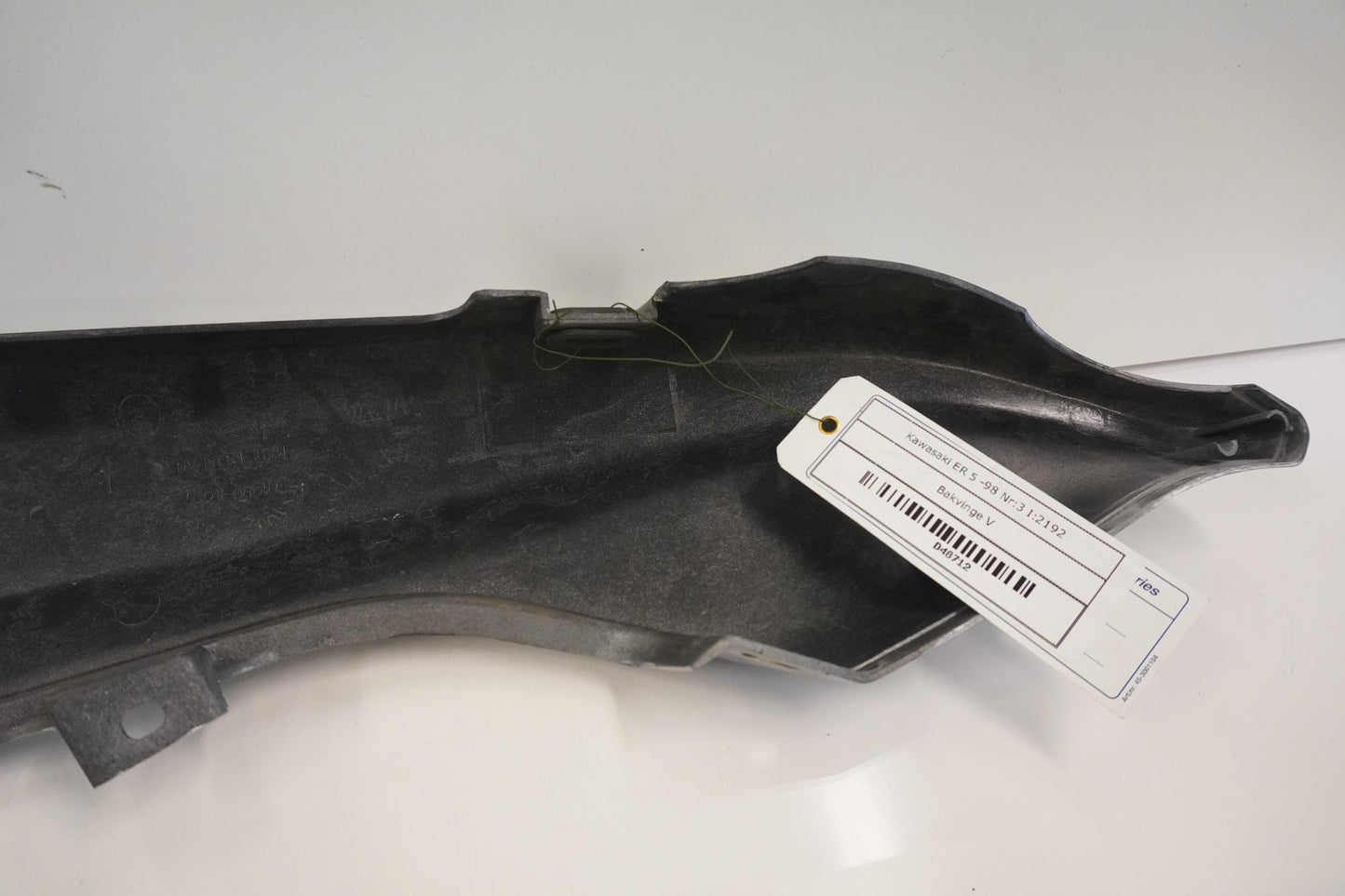 Snett uppifrån på Bakvinge från en Kawasaki ER 5 -1998 motorcykel.