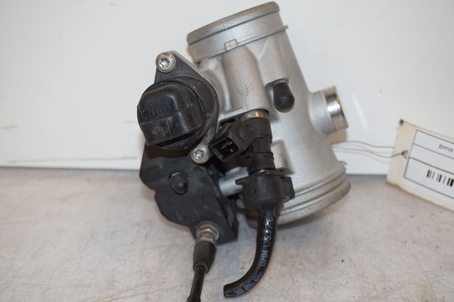 Baksidan på Spjällhus från en BMW R 1200 GS -2007 motorcykel.