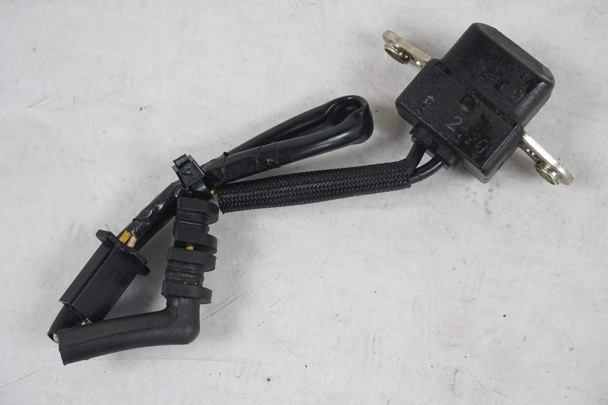 Framsidan på Tändpickup från en Honda CBR 900 RR -1998 motorcykel.