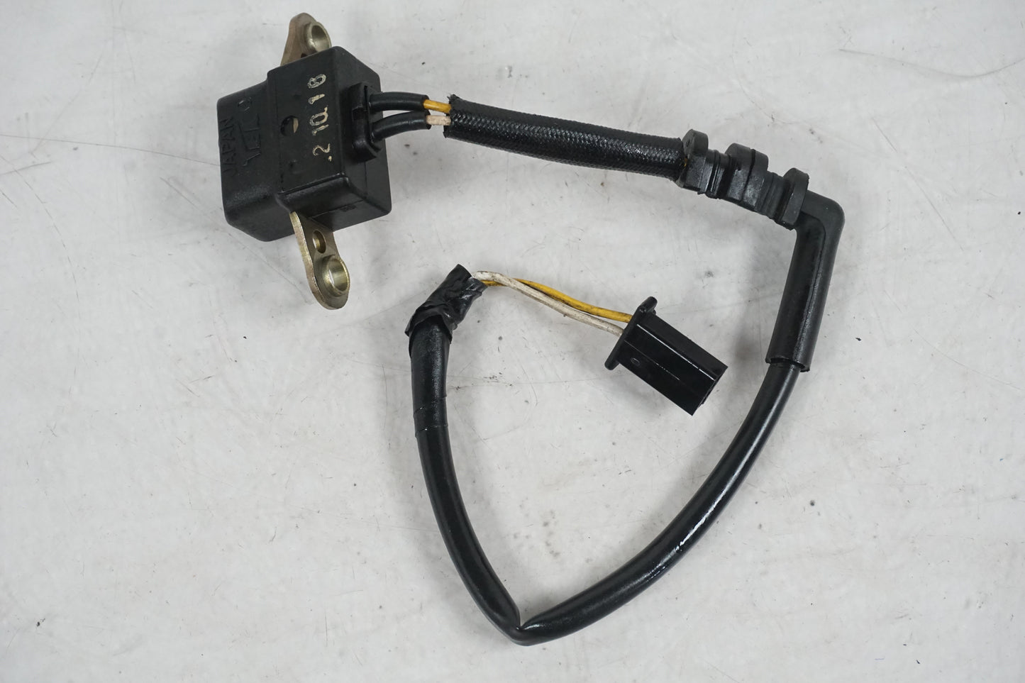 Framsidan på Tändpickup från en Honda CBR 900 RR -1993 motorcykel.