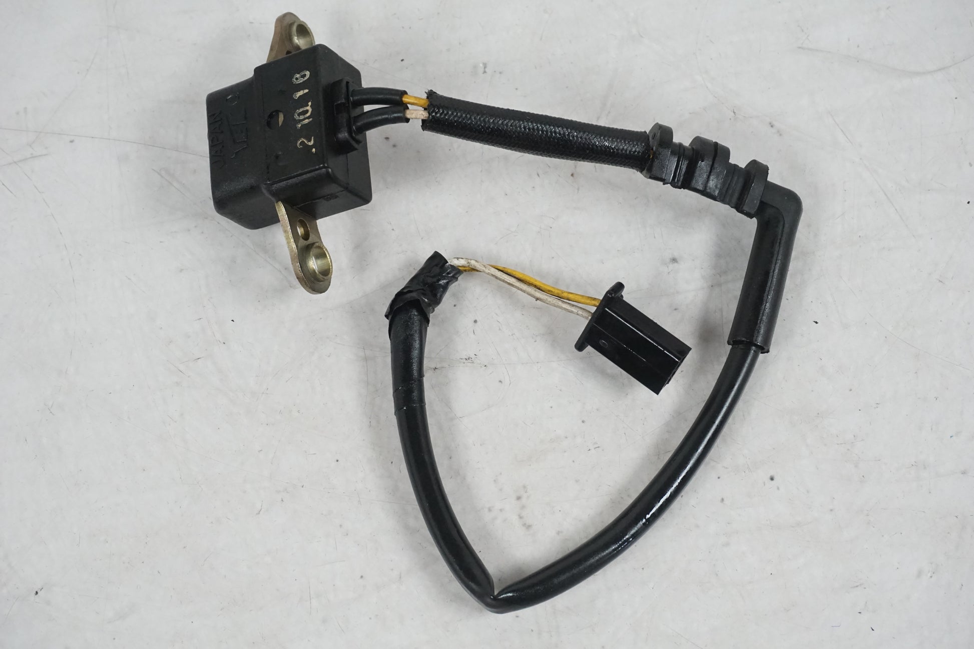 Framsidan på Tändpickup från en Honda CBR 900 RR -1993 motorcykel.