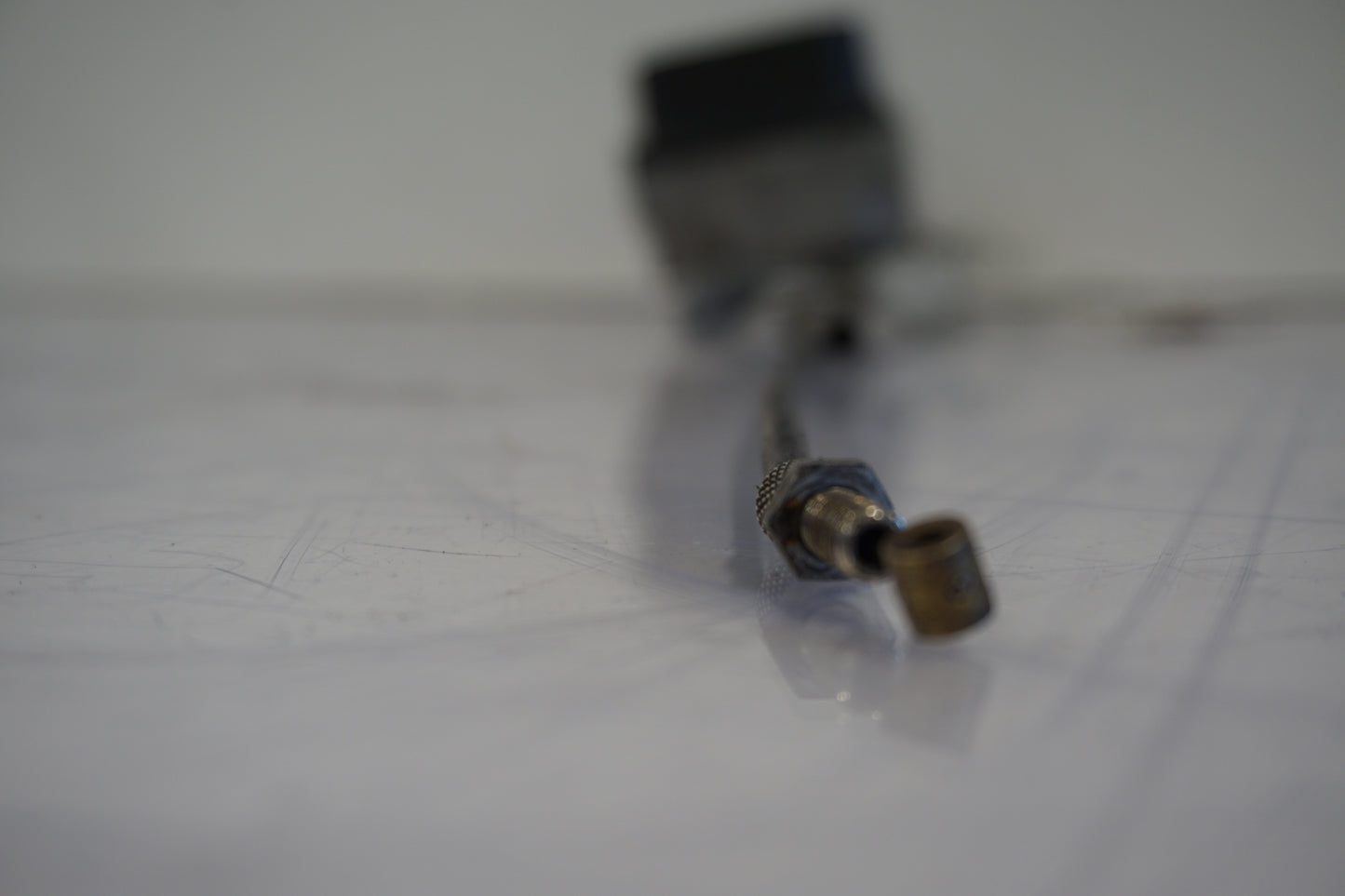 Vänster sida på Farthållarservo från en BMW K 1200 LT -2004 motorcykel.