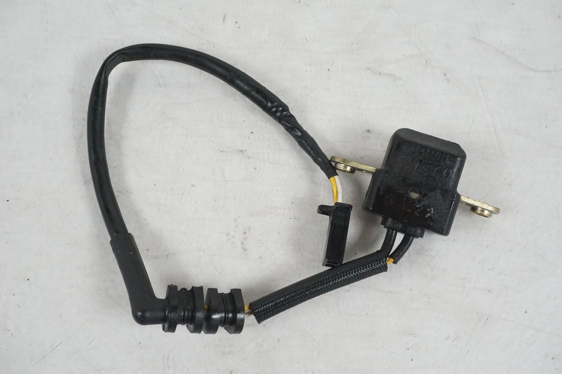 Framsidan på Tändpickup från en Honda CBR 900 RR -1997 motorcykel.