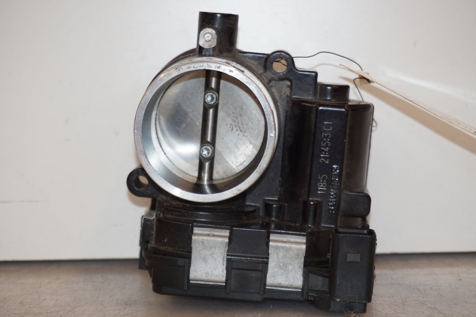 Framsidan på Spjällhus från en BMW R 1200 RS -2015 motorcykel.