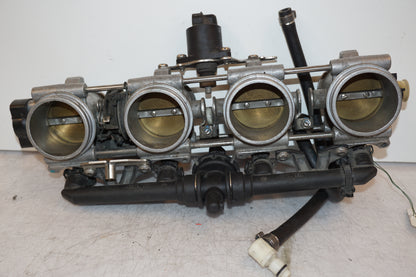 Framsidan på Spjällhus från en BMW K 1200 R Sport -2007 motorcykel.