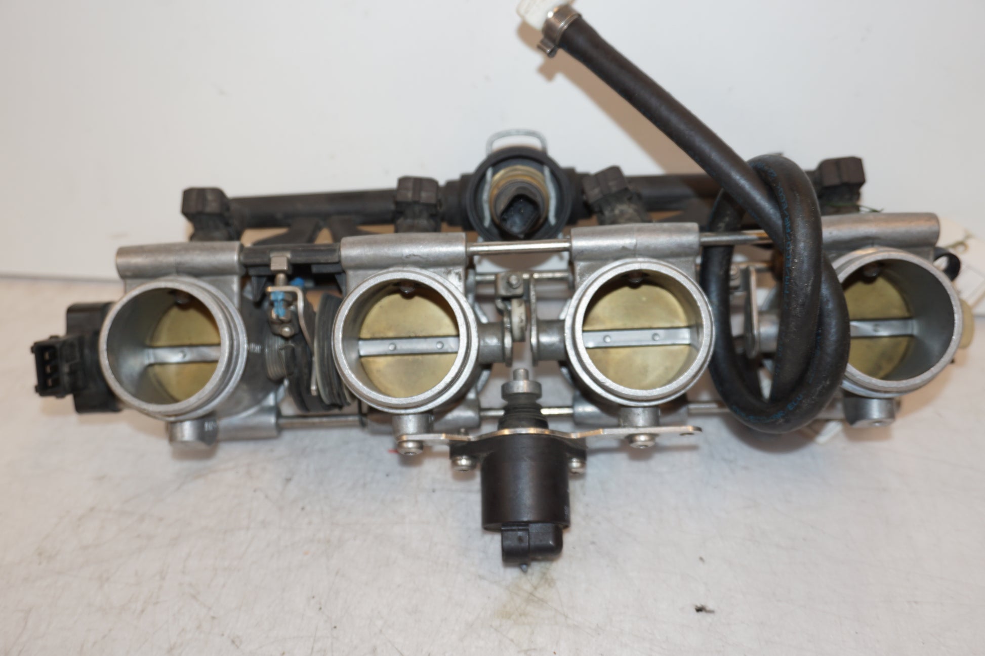 Höger sida på Spjällhus från en BMW K 1200 R Sport -2007 motorcykel.