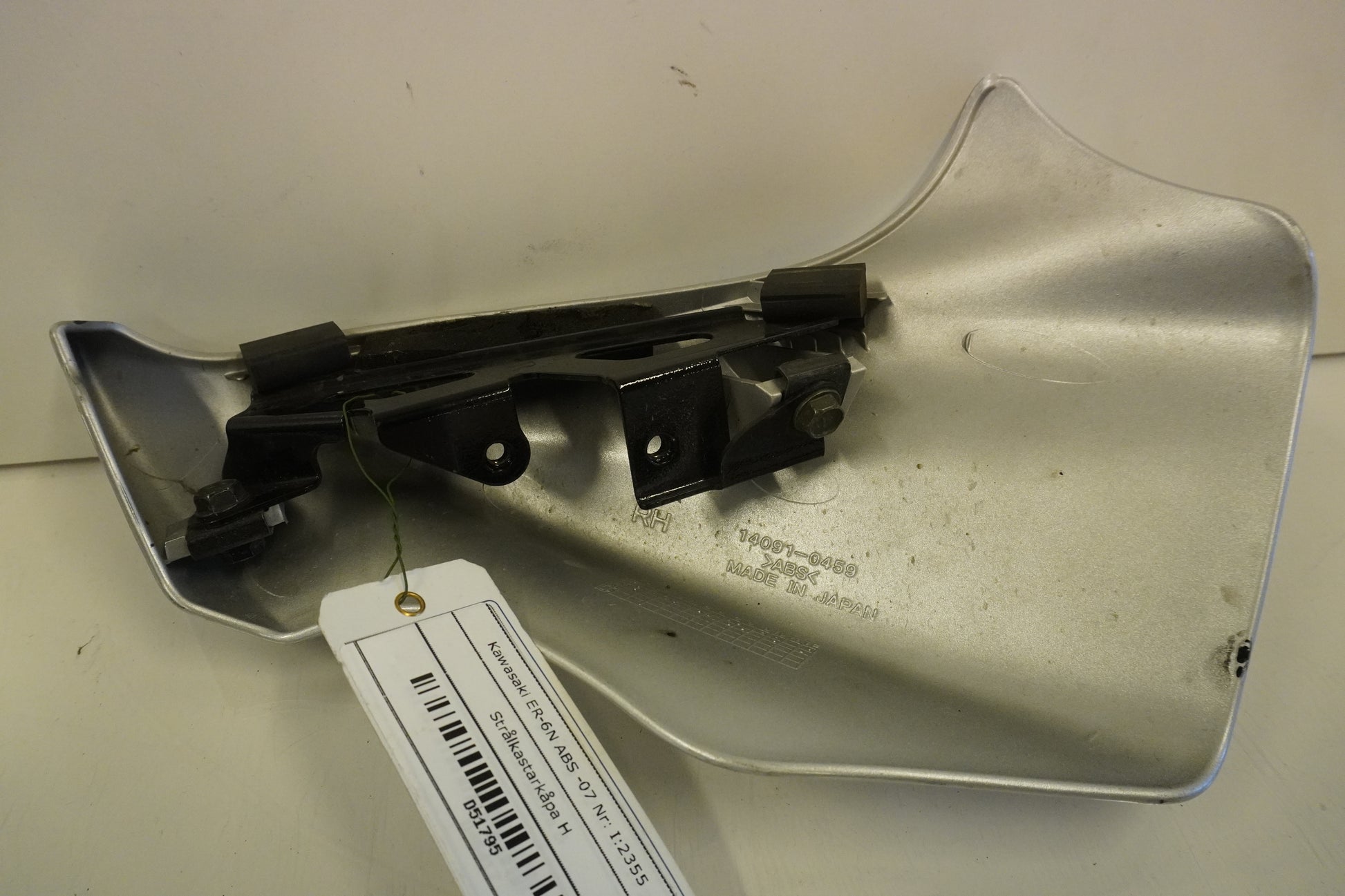 Höger sida på Strålkastarkåpa från en Kawasaki ER-6N -2007 motorcykel.