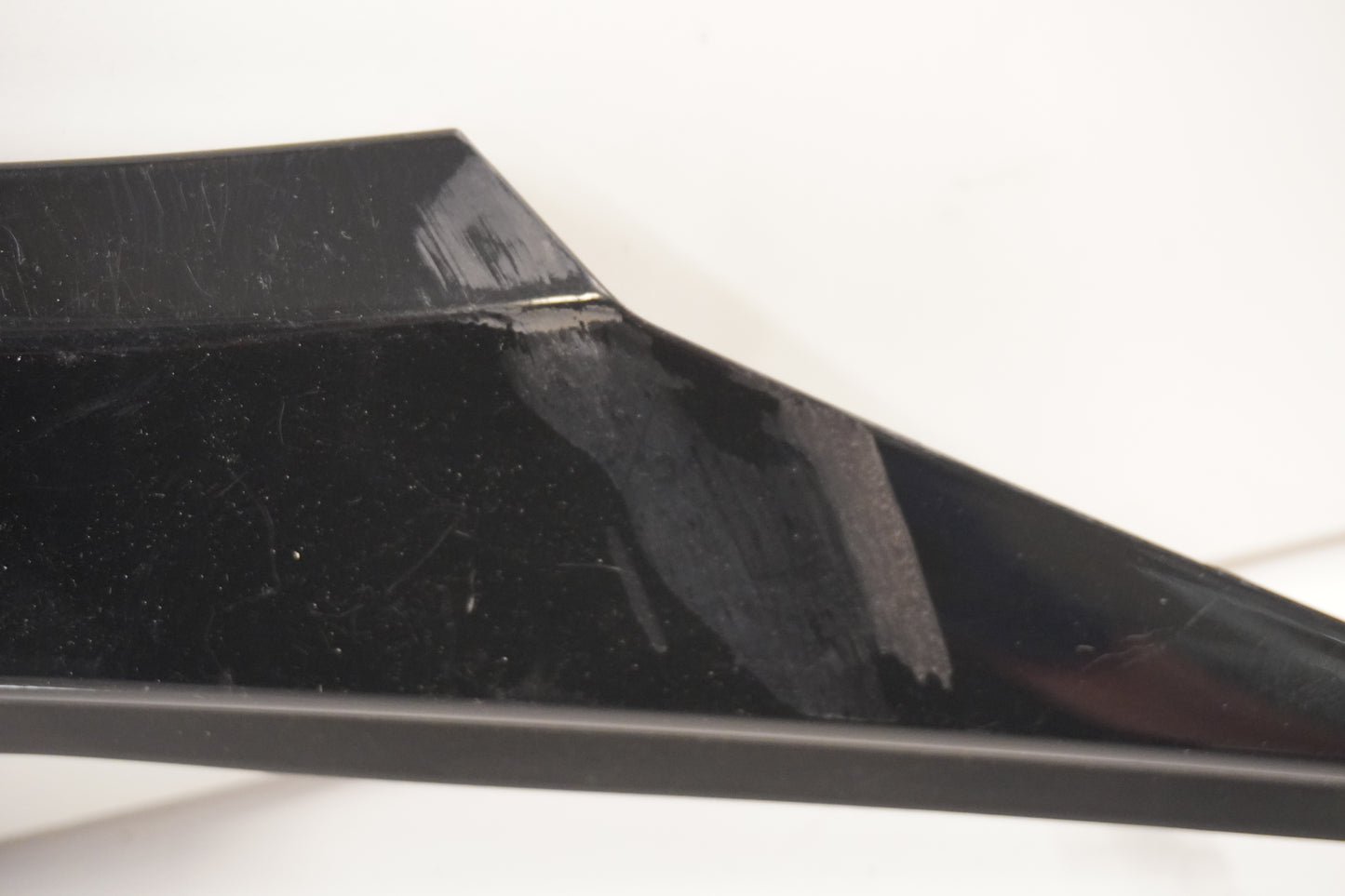 Baksidan på Sidopanel från en Kawasaki Ninja 300 -2013 motorcykel.