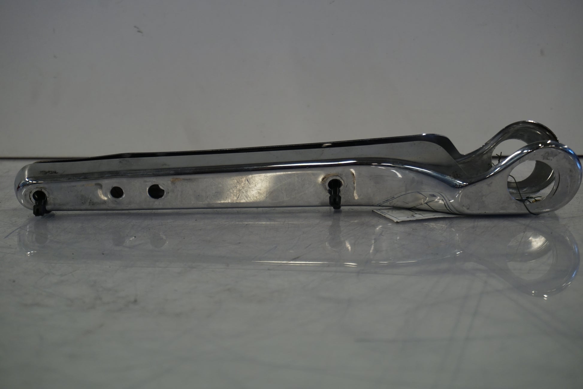 Vänster sida på Bakskärmstag från en H-D Sportster 883 XL -1997 motorcykel.