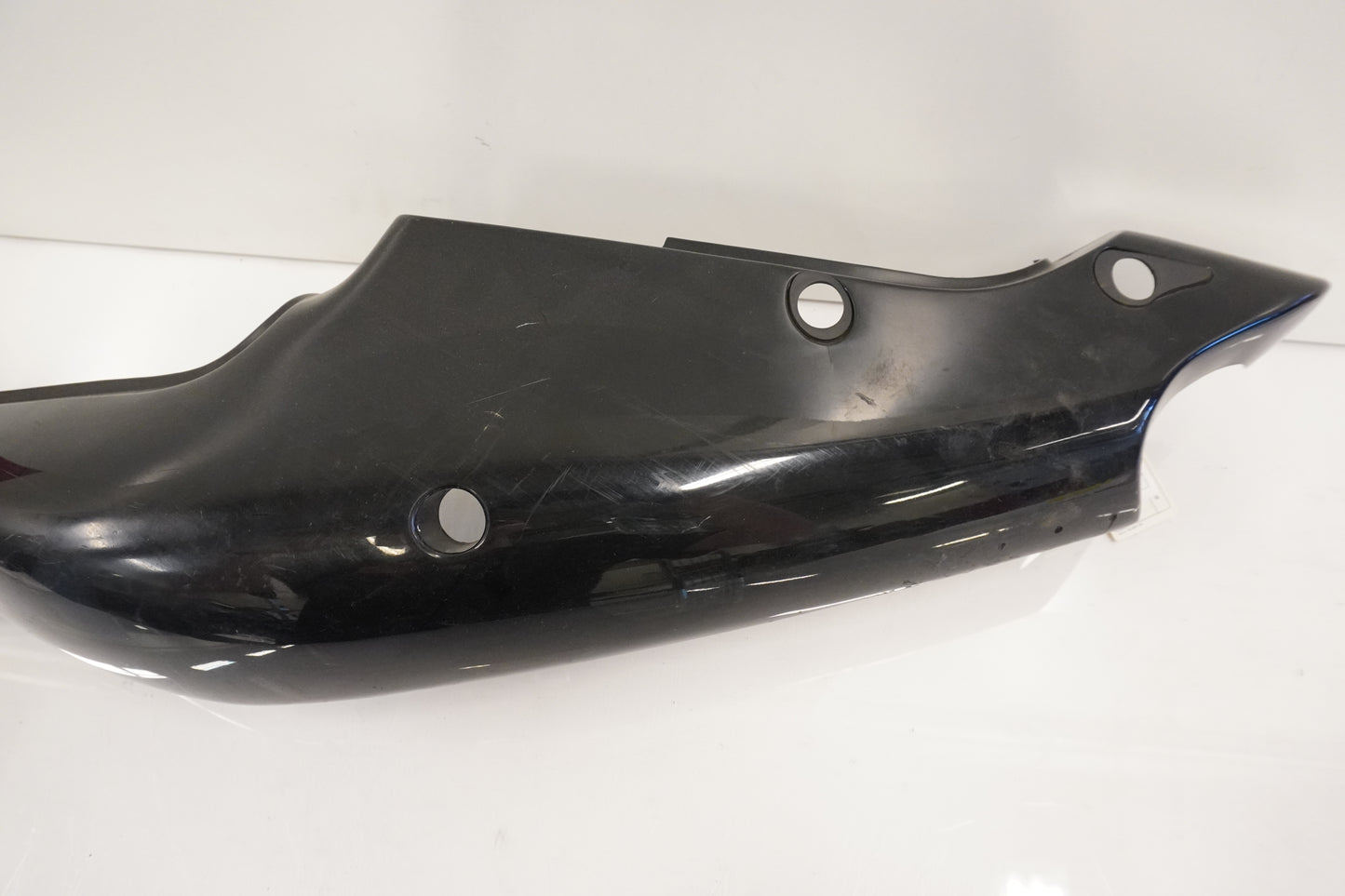 Vänster sida på Bakvinge från en Kawasaki ZX-7R -1997 motorcykel.