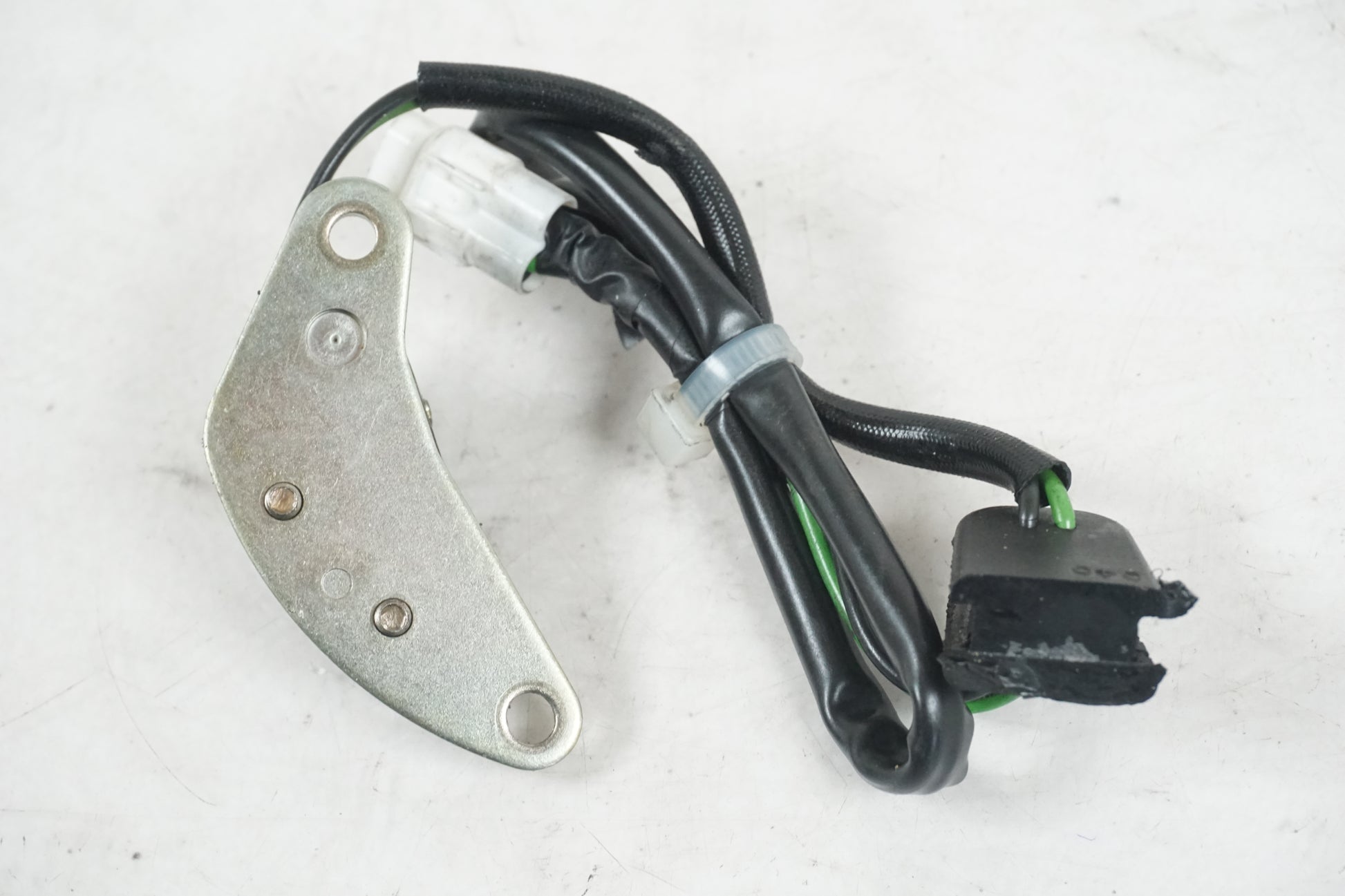 Höger sida på Tändpickup från en Suzuki GSX-R 750 -2000 motorcykel.