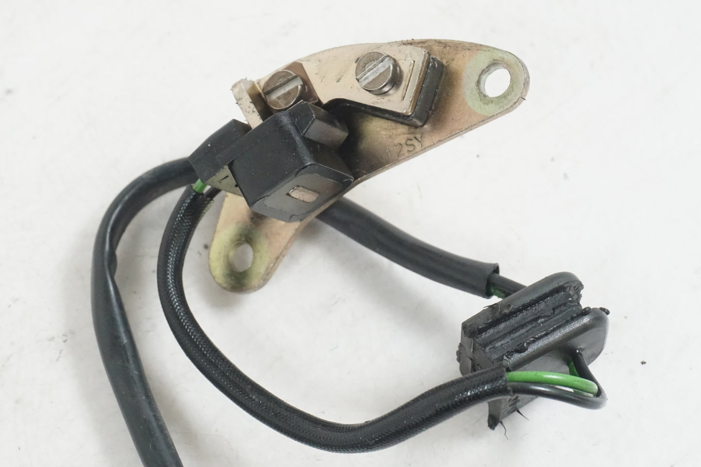 Höger sida på Tändpickup från en Suzuki GSX-R 750 -1998 motorcykel.