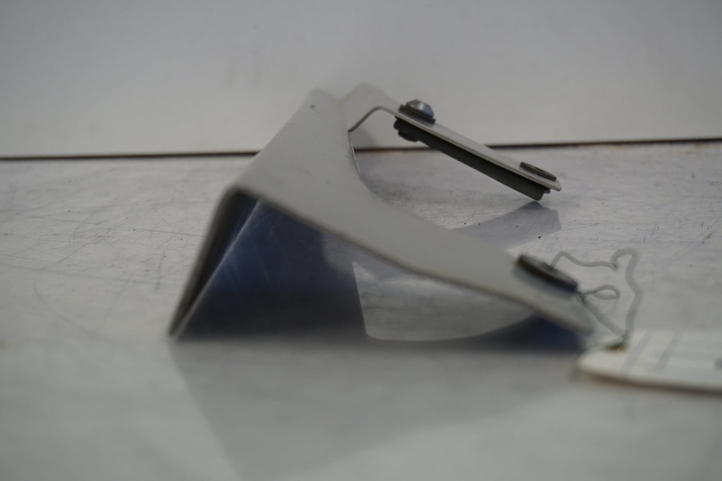 Snett nerifrån på Remskydd från en Yamaha XV 1700 -2003 motorcykel.