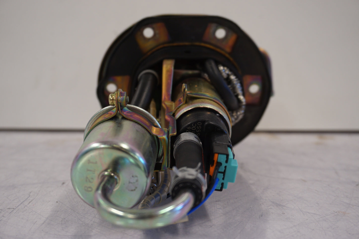 Vänster sida på Bensinpump insprut från en Honda CBR 900 RR -2002 motorcykel.