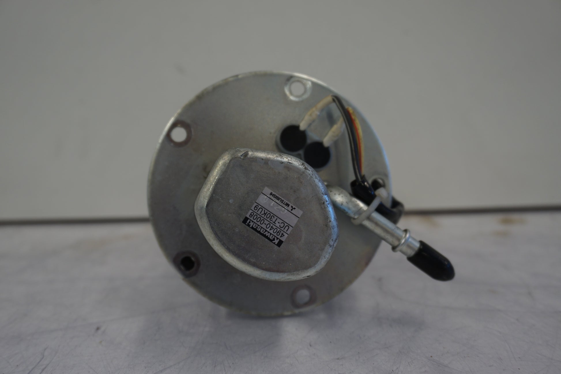 Snett uppifrån på Bensinpump insprut från en Kawasaki VN 1600 -2006 motorcykel.