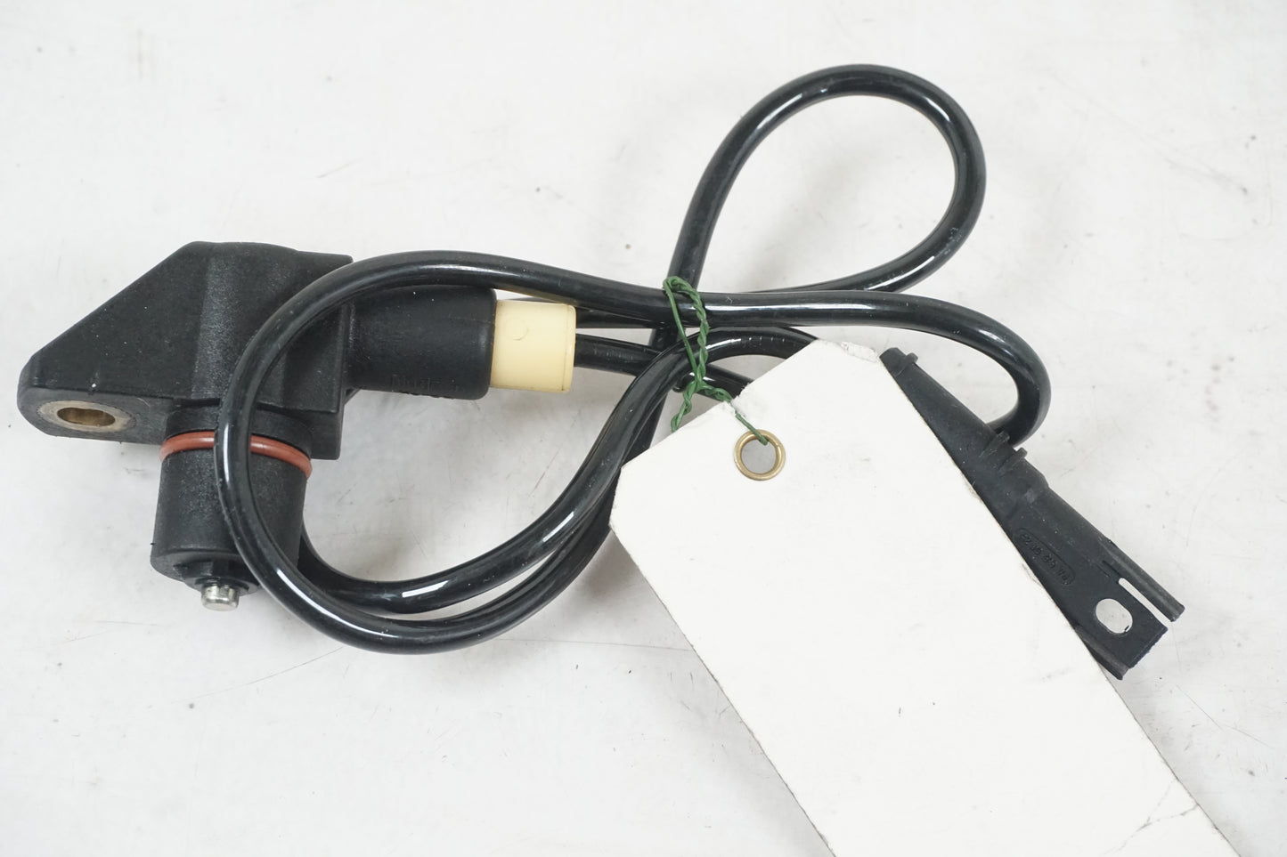 Baksidan på Tändpickup från en BMW S 1000 RR -2011 motorcykel.