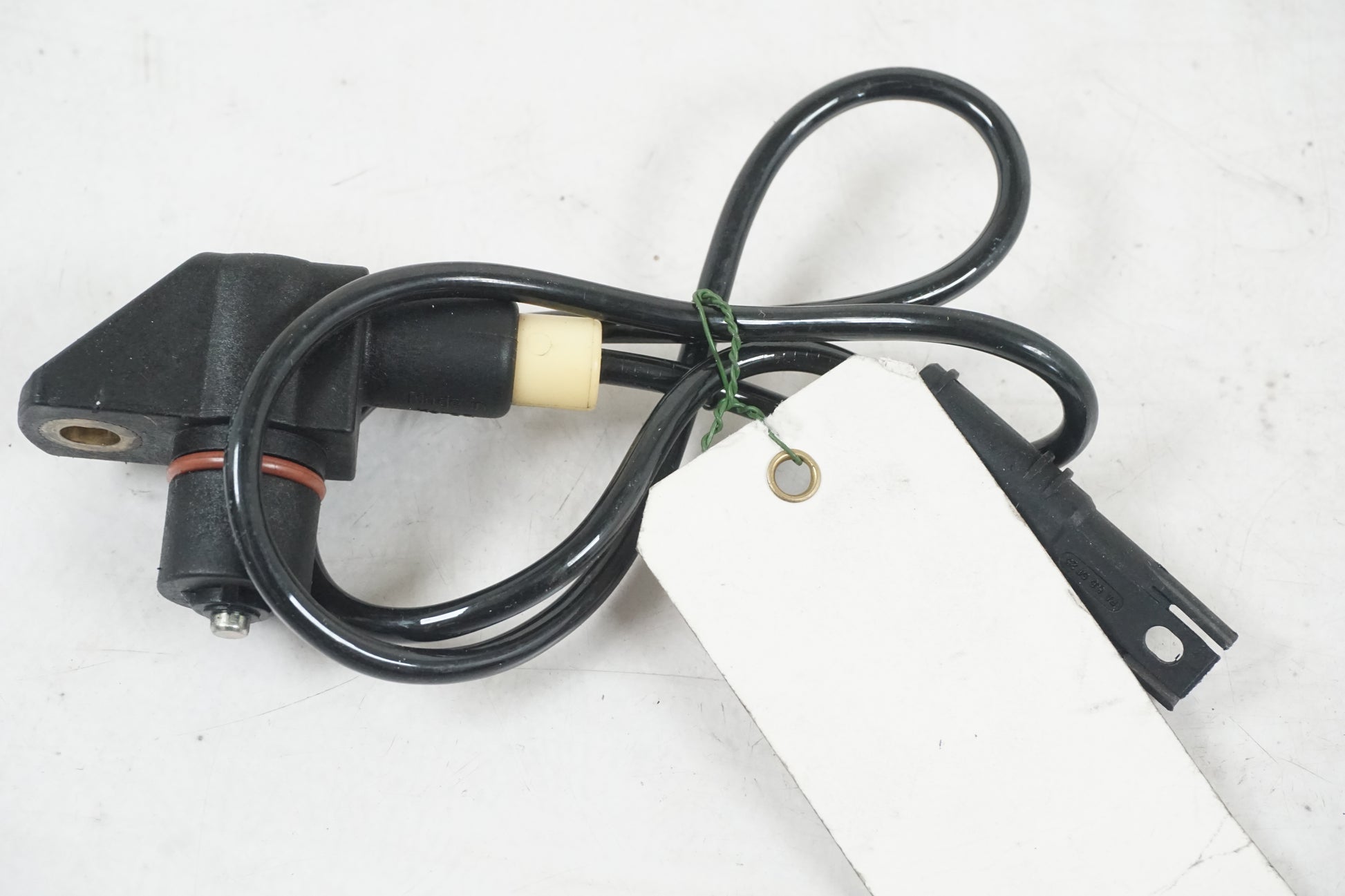 Baksidan på Tändpickup från en BMW S 1000 RR -2011 motorcykel.