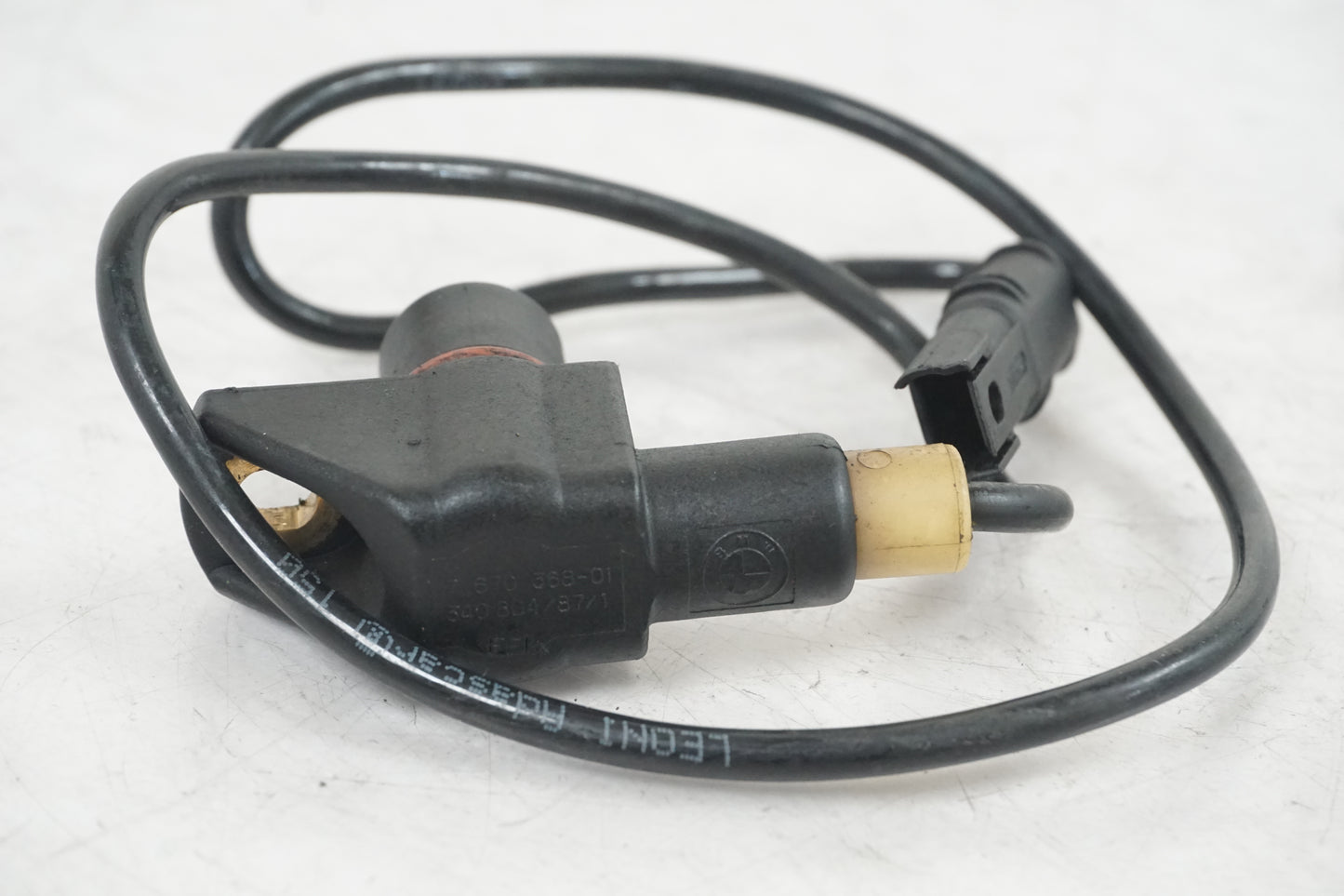 Baksidan på Tändpickup från en BMW S 1000 RR -2010 motorcykel.