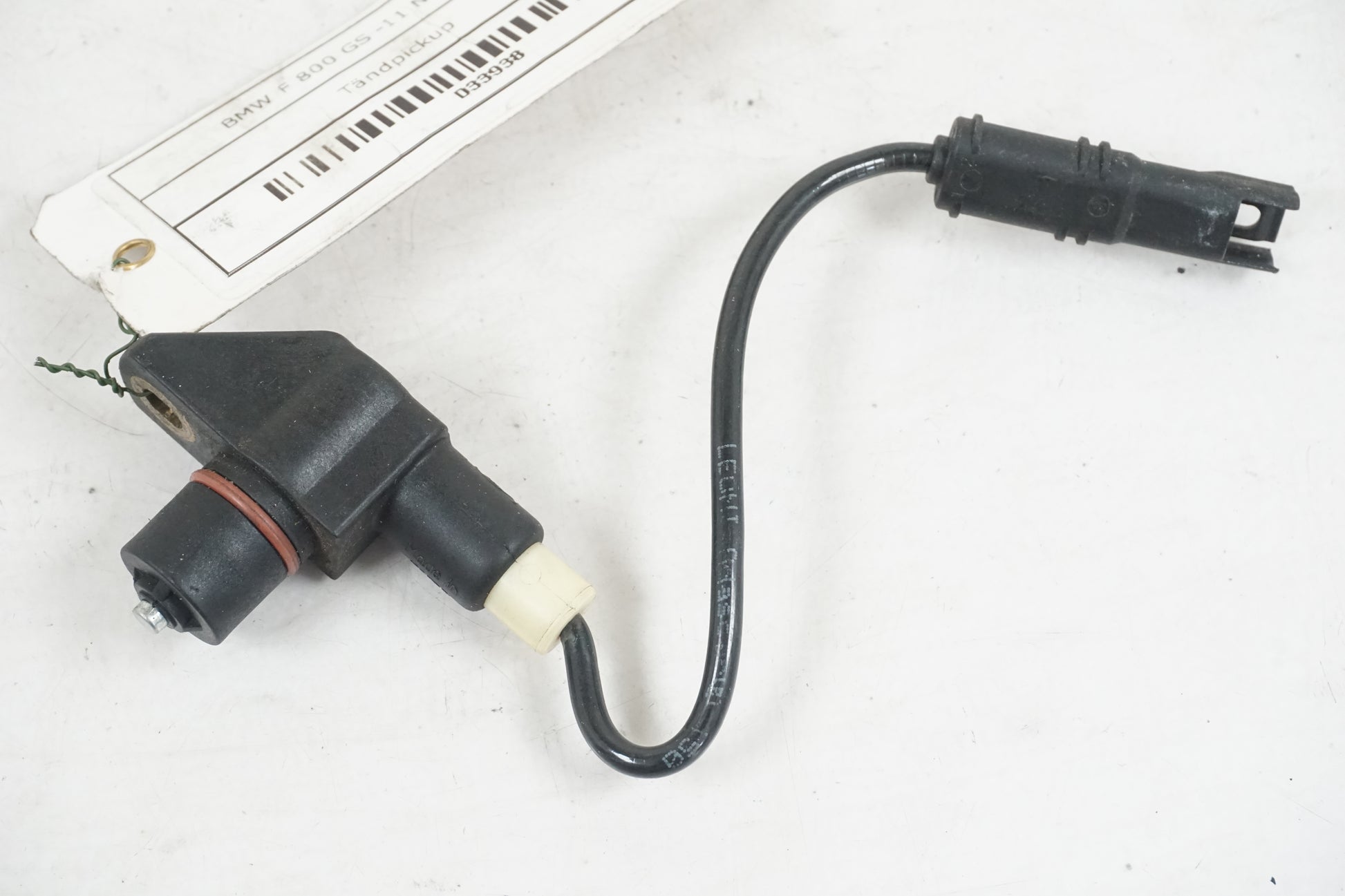 Framsidan på Vevaxelsensor från en BMW F 800 GS -2011 motorcykel.