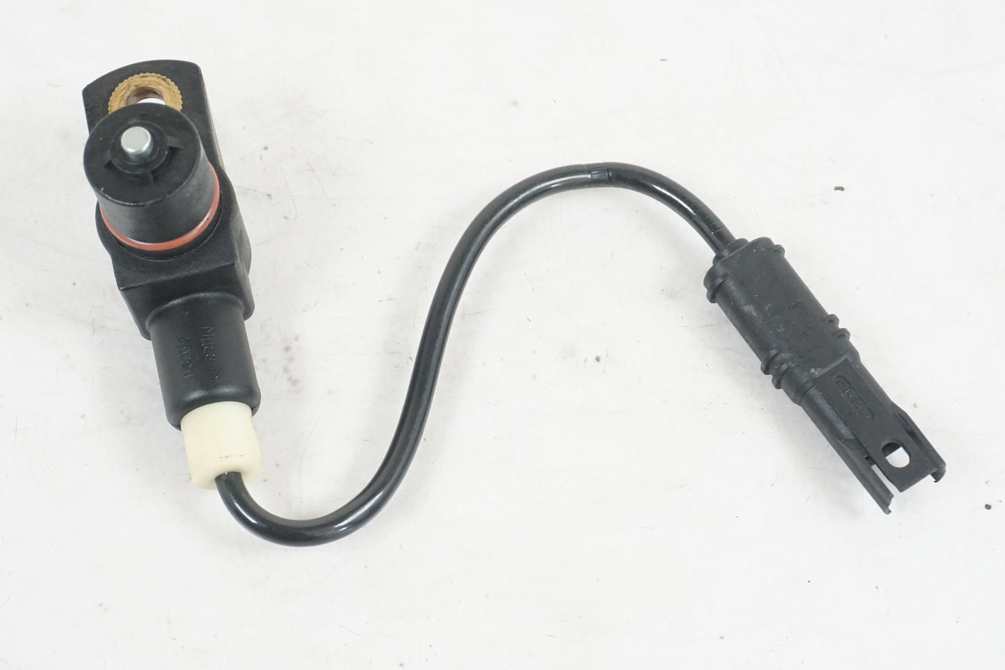 Framsidan på Vevaxelsensor från en BMW F 800 R -2011 motorcykel.