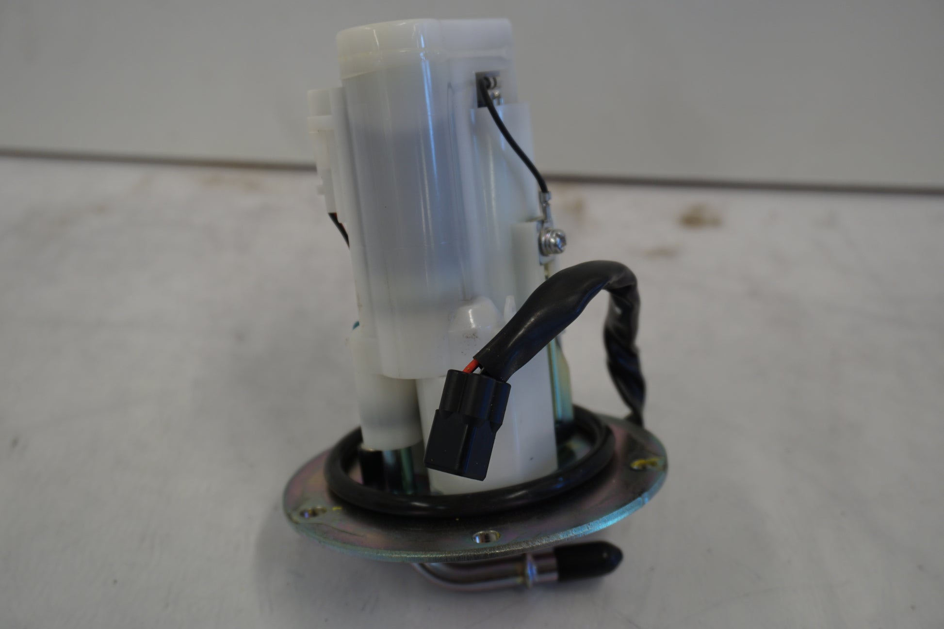 Baksidan på Bensinpump insprut från en Kawasaki Ninja 300 -2014 motorcykel.